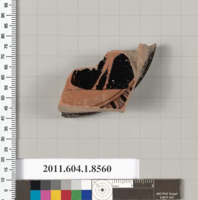 Terracotta fragment of a stemless kylix (drinking cup)