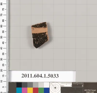 Terracotta fragment of a kylix (drinking cup)