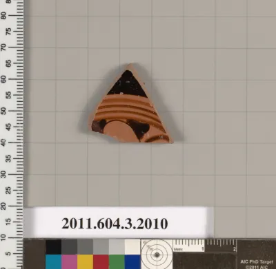 Terracotta fragment of a kylix (drinking cup)