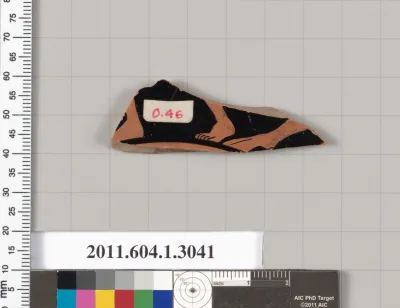 Terracotta fragment of a kylix (drinking cup)