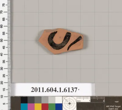 Terracotta fragment of a kylix (drinking cup)