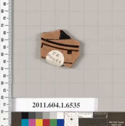 Terracotta fragment of a kylix (drinking cup)