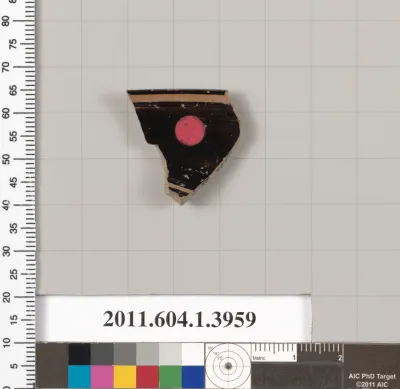 Terracotta fragment of a kylix (drinking cup)