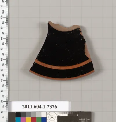 Terracotta fragment of a kylix (drinking cup)