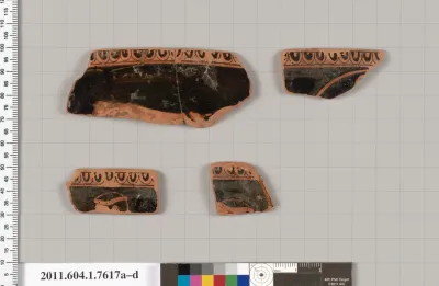 Terracotta rim fragments of a kylix (drinking cup)
