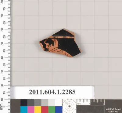 Terracotta fragment of a kylix (drinking cup)