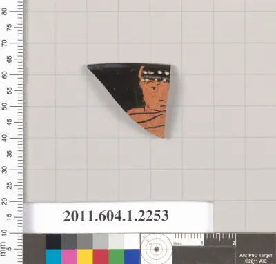 Terracotta rim fragment of a kylix (drinking cup)