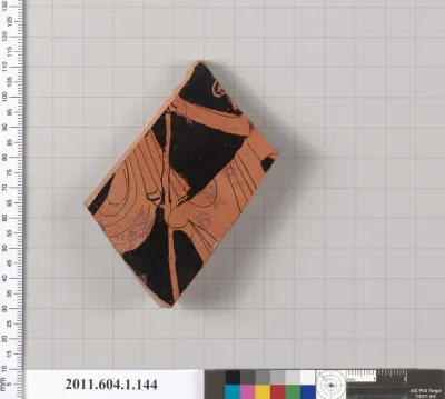 Terracotta fragment of a kylix (drinking cup)