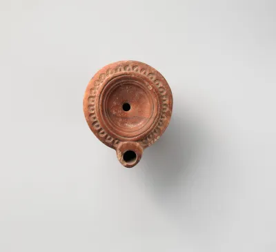 Terracotta oil lamp
