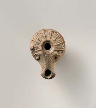 Terracotta oil lamp