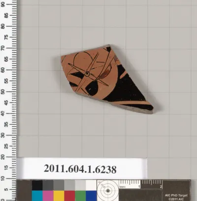 Terracotta fragment of a kylix (drinking cup)