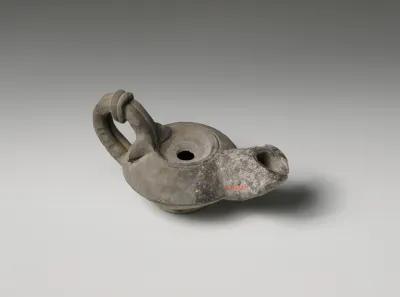Terracotta oil lamp