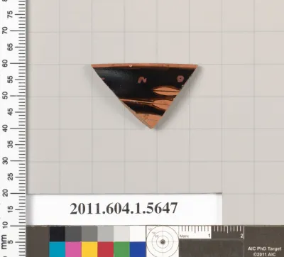 Terracotta rim fragment of a kylix (drinking cup)
