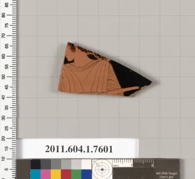 Terracotta fragment of a kylix (drinking cup)
