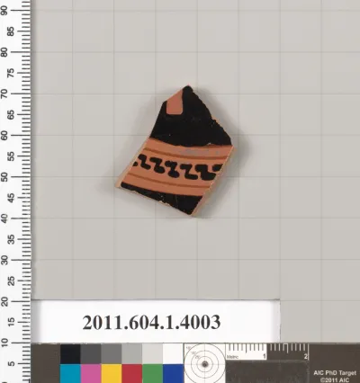 Terracotta fragment of a kylix (drinking cup)