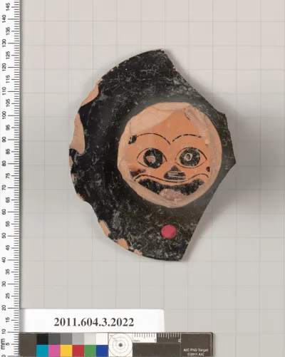 Terracotta fragment of a kylix (drinking cup)