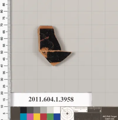 Terracotta rim fragment of a kylix (drinking cup)