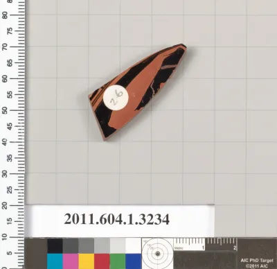 Terracotta fragment of a kylix (drinking cup)