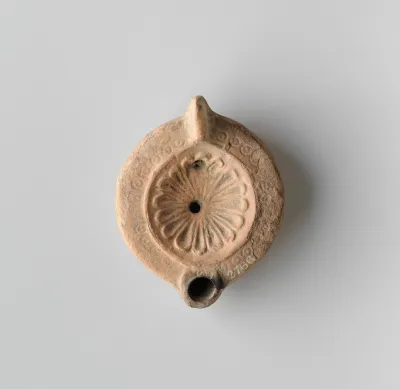 Terracotta oil lamp
