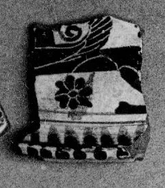 PYXIS LID, FRAGMENT (EAST GREEK, NAUCRATITE, BLACK-FIGURE)