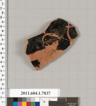 Terracotta fragment of a kylix (drinking cup)