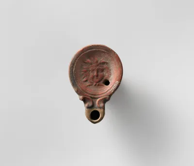 Terracotta oil lamp