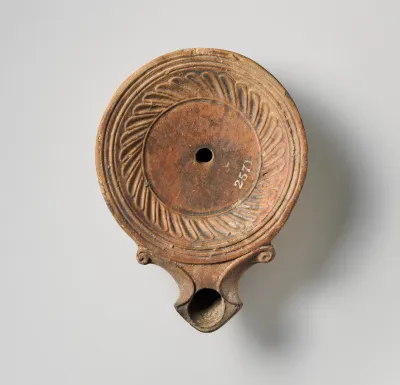 Terracotta oil lamp