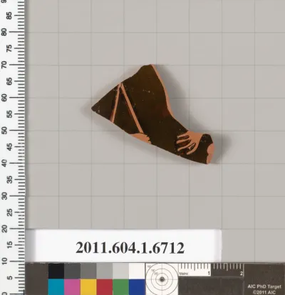 Terracotta fragment of a kylix (drinking cup)