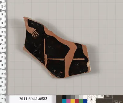 Terracotta fragment of a kylix (drinking cup)