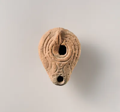 Terracotta oil lamp