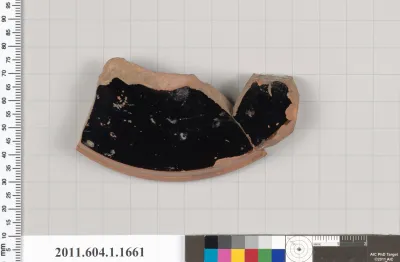 Terracotta fragment of a kylix (drinking cup)