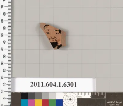 Terracotta fragment of a kylix (drinking cup)