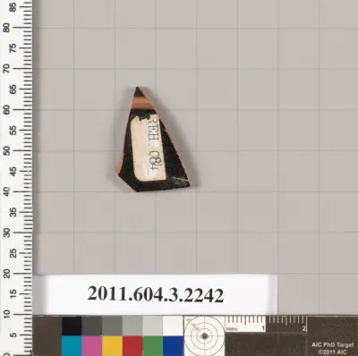 Terracotta fragment of a kylix (drinking cup)