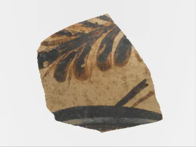 Terracotta vessel fragment with floral motif and band