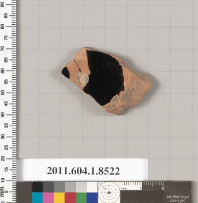 Terracotta fragment of a stemless kylix (drinking cup)