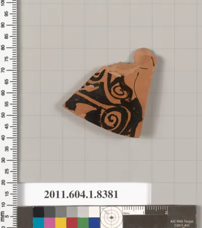 Terracotta fragment of a kylix (drinking cup)