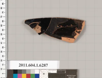 Terracotta rim fragment of a kylix (drinking cup)