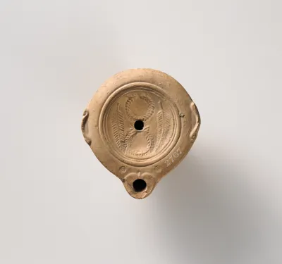 Terracotta oil lamp