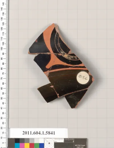 Terracotta fragment of a kylix: eye-cup  (drinking cup)