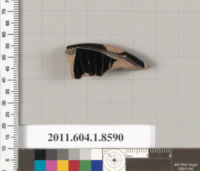 Terracotta fragment of a stemless kylix (drinking cup)