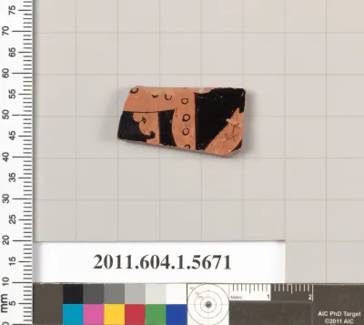 Terracotta fragment of a kylix (drinking cup)