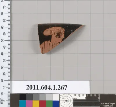 Terracotta rim fragment of a kylix (drinking cup)