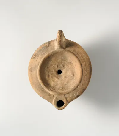Terracotta oil lamp