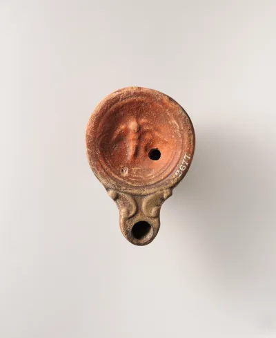 Terracotta oil lamp