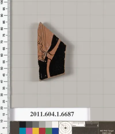 Terracotta fragment of a kylix (drinking cup)