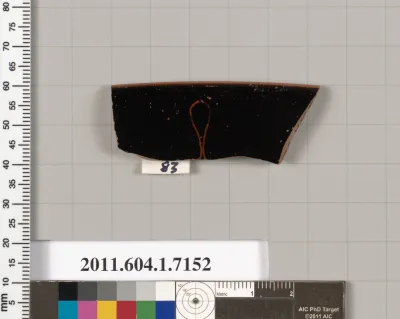 Terracotta rim fragment of a kylix (drinking cup)