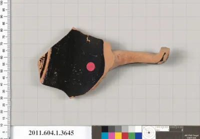 Terracotta fragment of a kylix (drinking cup)