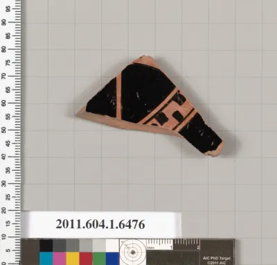 Terracotta fragment of a kylix (drinking cup)