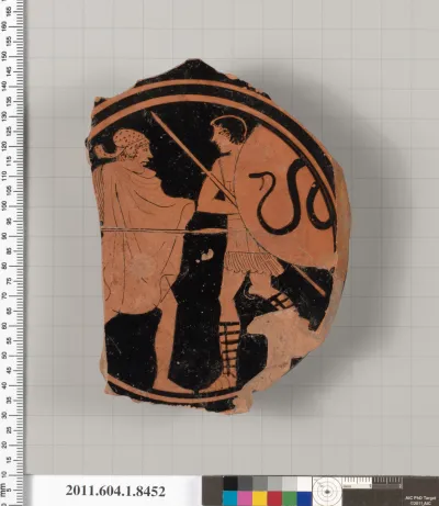 Terracotta fragment of a stemless kylix (drinking cup)