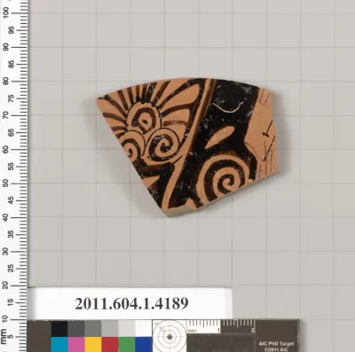 Terracotta fragment of a kylix (drinking cup)